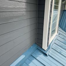 House-wash-and-sheet-metal-roof-cleaning-in-Newport-OR 0